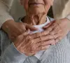 Hands over heart