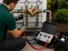 NOCO technician performing backflow testing