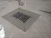 Concrete grate in the ground