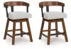 Ralene - Upholstered Swivel Barstool (Set of 2) - Medium Brown