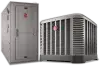 Two Rheem HVAC units; a furnace on the left and an outdoor air conditioner on the right.