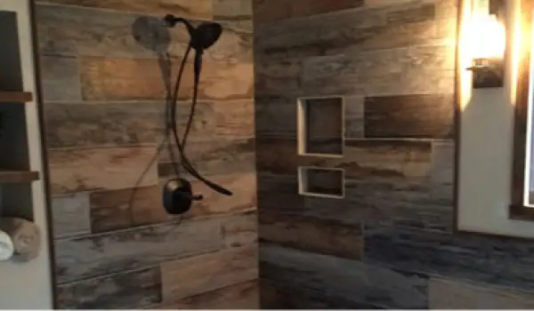 new shower tiled by class a construction