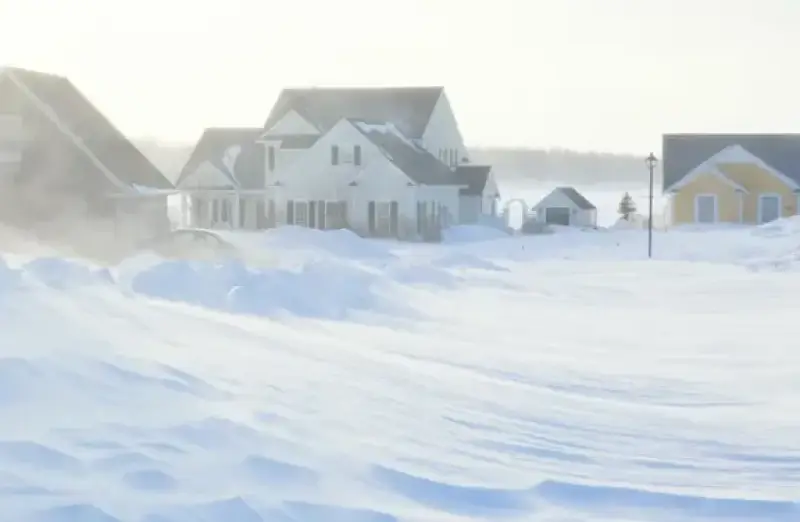 neighborhood covered in snow
