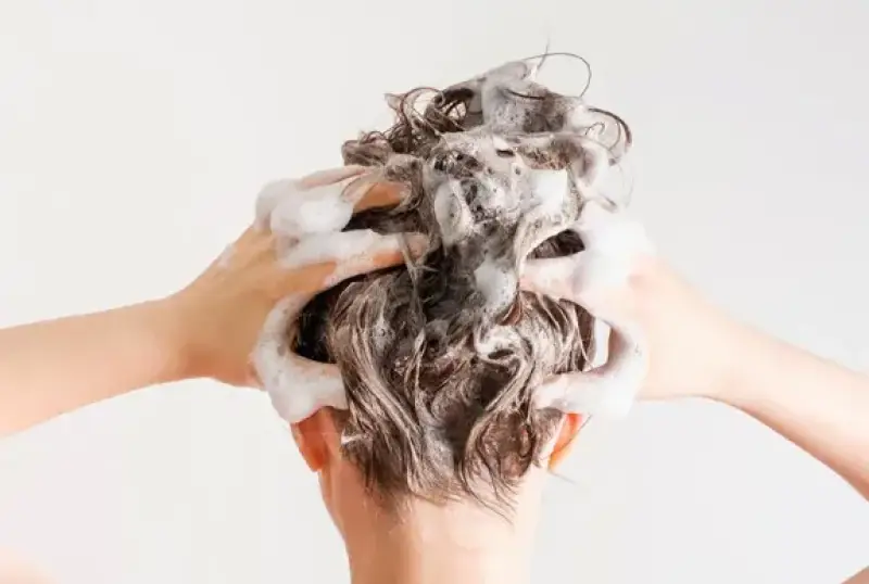person washing hair